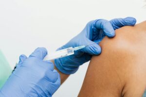Shoulder cortisone injection being administered by a healthcare professional